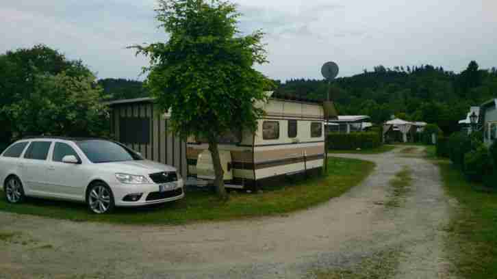 Dauercampingplatz Wohnwagen mit Vorzelt am Bodensee fest ausgebaut mit Freibad