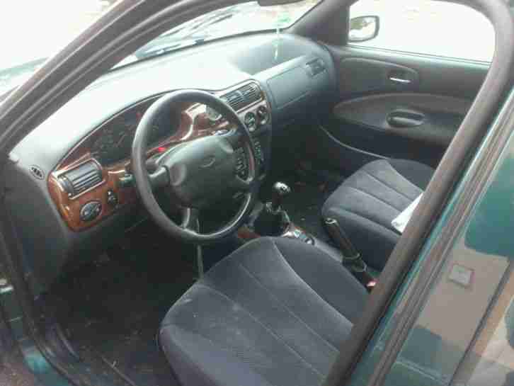 Ford Escort Kombi Ghia 16v, scheckheft, 90ps anschauen