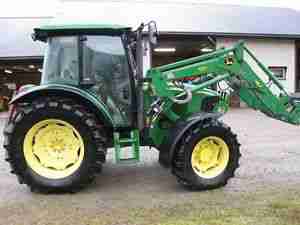 John Deere 582O .. Traktor