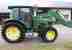John Deere 582O .. Traktor
