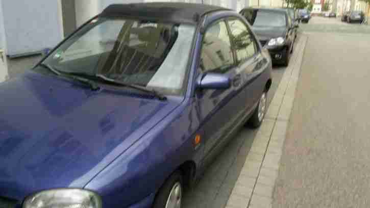 Mazda 121 mit elektronischen faltdach und TÜV