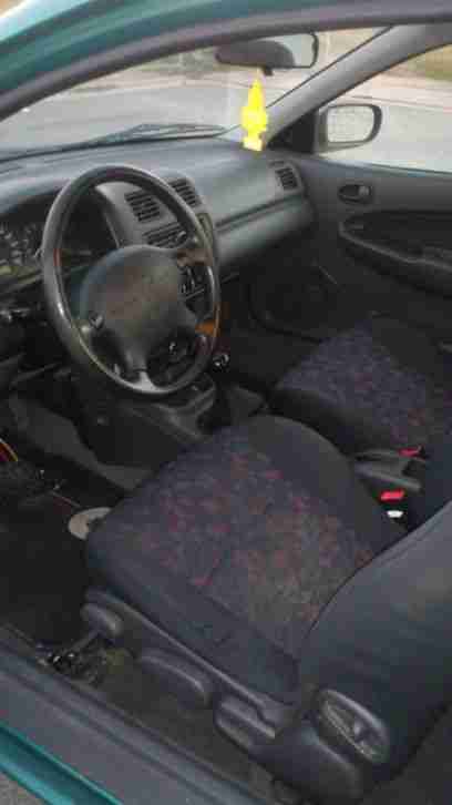 Mazda 323, 125.000 km