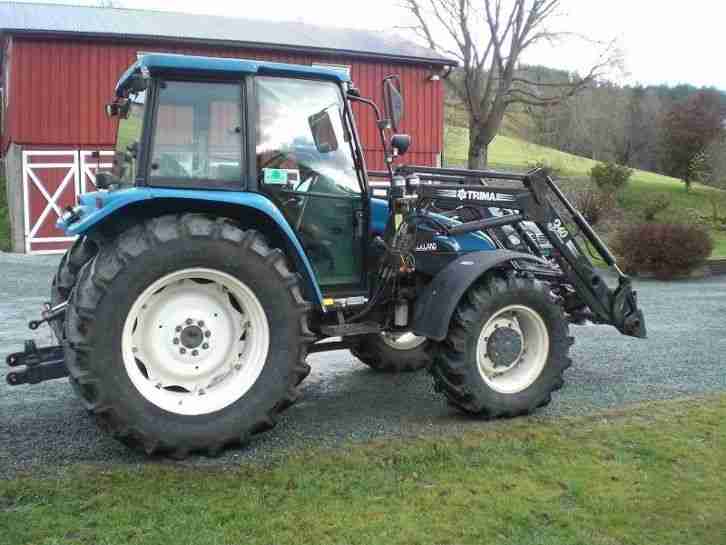 New Holland TL1OO - Traktor - Jahr 1999 -