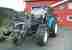 New Holland TL1OO Traktor Jahr 1999