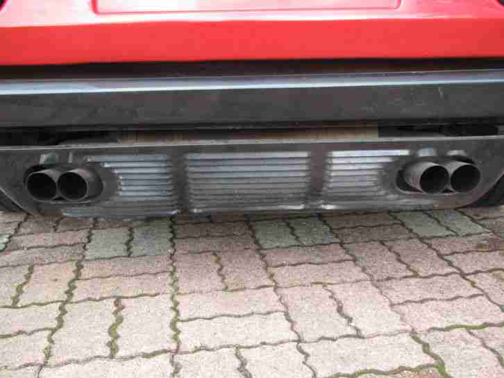 Oldtimer Ferrari 308 GTSi in rot mit Targadach schwarz, US-Version mit Titel