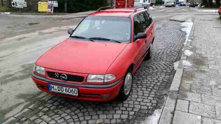Opel Astra F Caravan, Bj. 97, ca. 210000 km in rot, Winterreifen , 2. Satz So. R