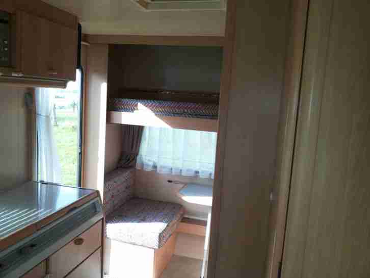 Wohnwagen Adria Optima mit Stockbett,Nasszelle,TÜV+GAS neu,Vorzelt,leer 690kg