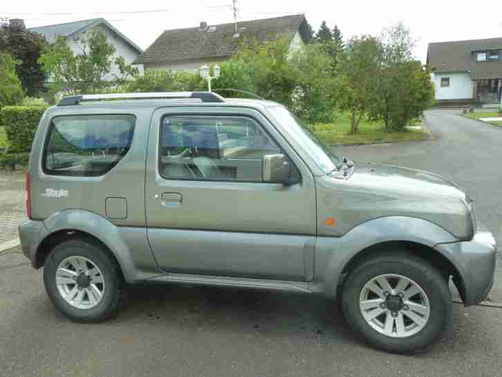 gepflegter Suzuki JIMNY in GRAU-GRÜN mit AHK, NAVI, Klima, Winterreifen Sitzhzg.